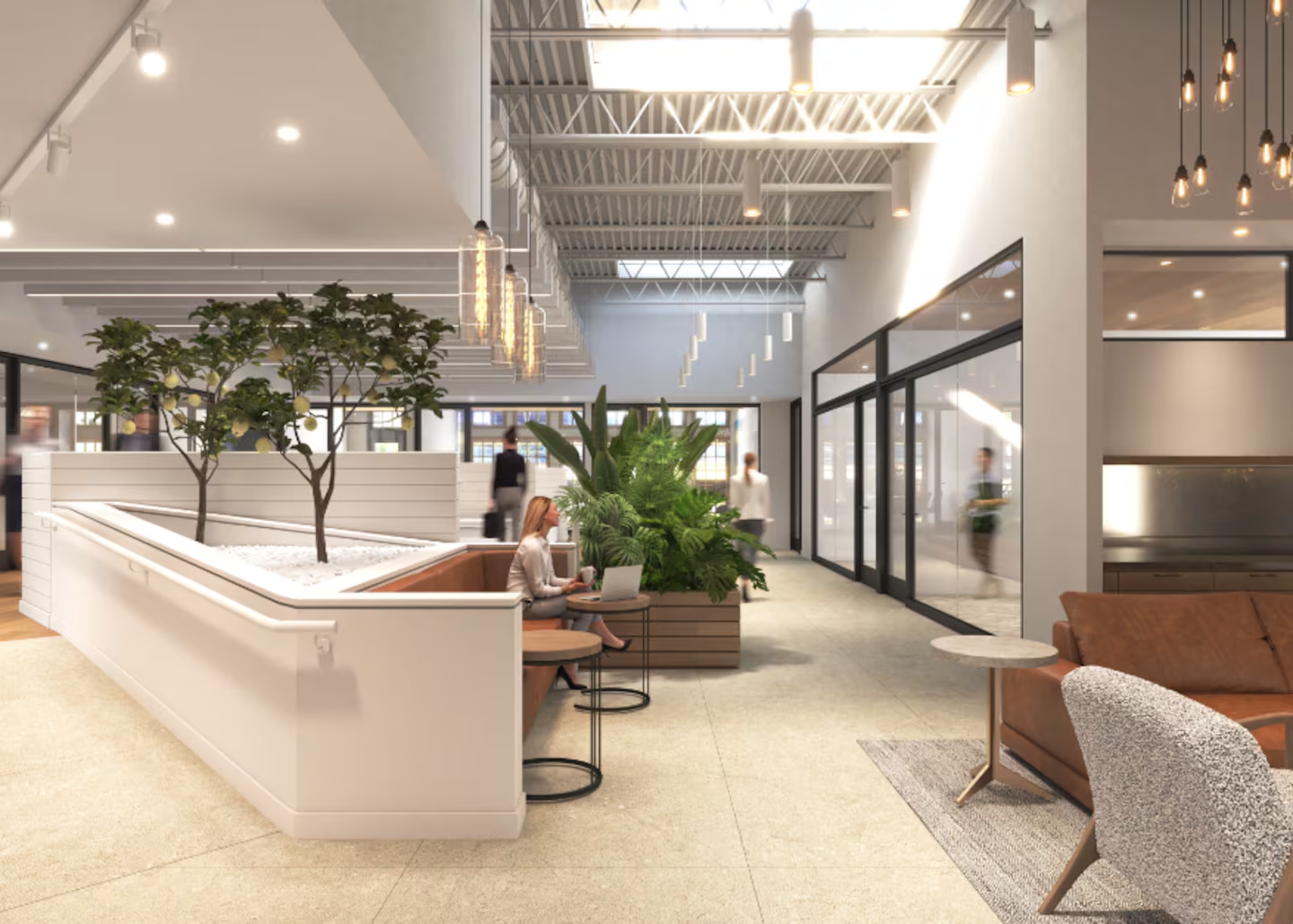 A café and collaboration commons anchors the center of the expanded floor plan.
